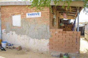 The exterior of a new mudbrick shelter.