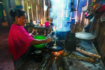 Woman cooking in guatemala