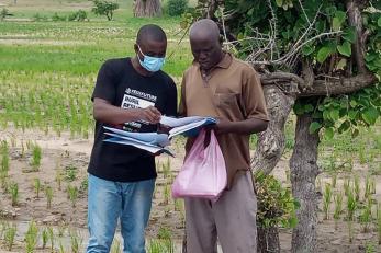 Educating a farmer on the benefit of agric insurance