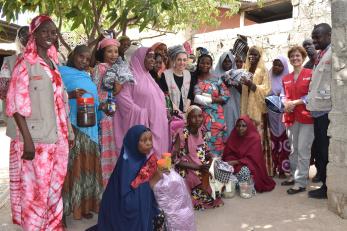 Group picture with members of aheri cooperative during mercy corps global vice president visit to maiduguri.