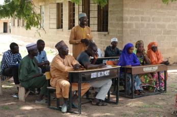 People attending a meeting.