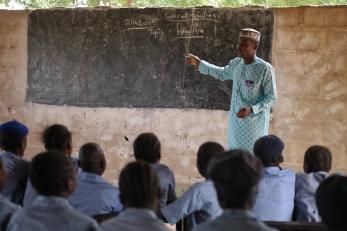 A teacher leading a class.