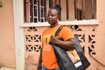 Magdalene joseph with her solar product kit.