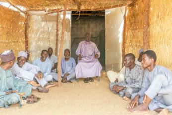 Zanna babagana, the acting district head of nguro soye having a meeting with other community leaders.