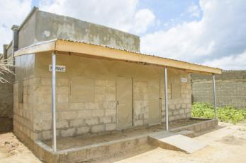 The side view of a transitional shelter.