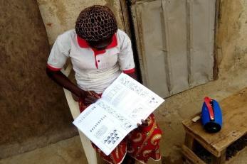Nigeria student working on classwork.