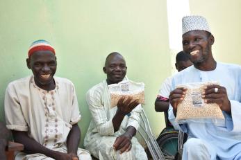 Members of gamayya disabled group display packs of cowpea processed and packaged through the collaboration.