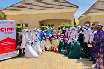 Cross-section of Adolescent Girls with Mercy Corps CIPP team and WeGirls Development Foundation at IWD2021 event in Katsina