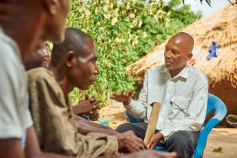 A group of people meeting together.