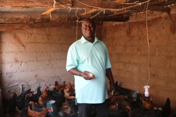 Paul Msheliza with his poultry birds.