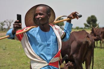 A person using a mobile phone.