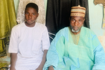  Musa Akilu with Adamu Usman Umaru, Head Teacher at the Islamic school.