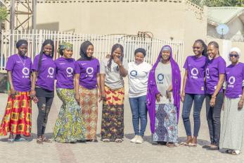 A group of women posing together.