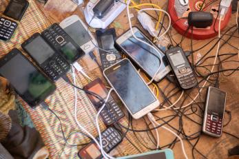 Mobile devices plugged in to charge.