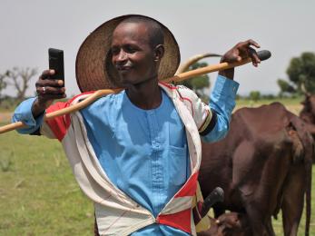 A person using a mobile phone.