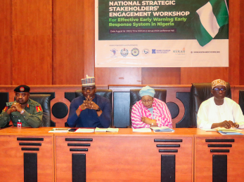 Key stakeholders from security agencies, INGOs and the private sector addressing the need for a more coordinated and efficient Early Warning Early Response system in Nigeria.